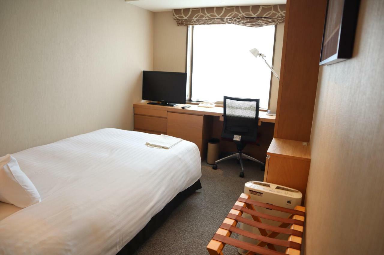 Hotel Associa Сидзуока Экстерьер фото A single room at the hotel